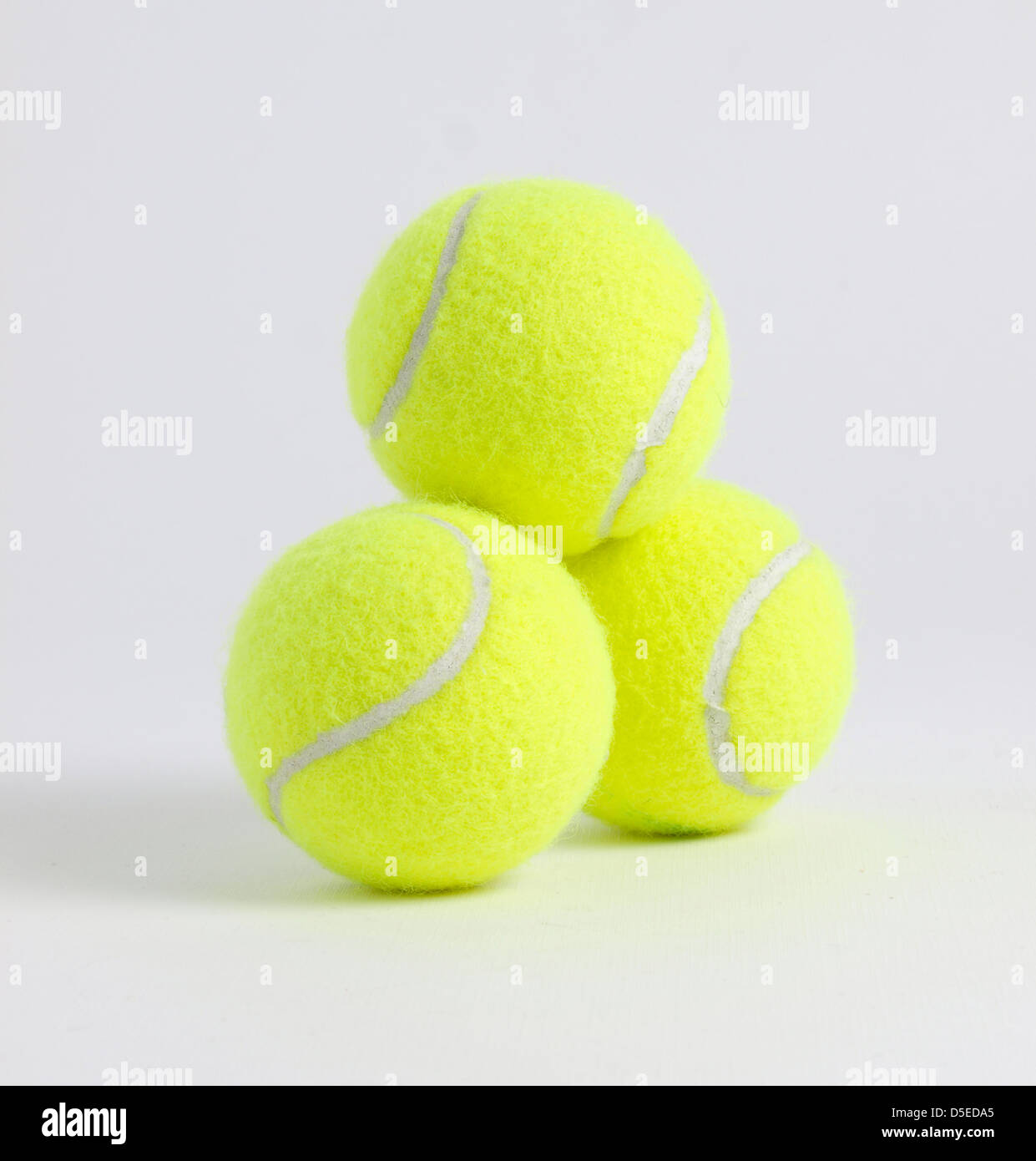 three paddle balls on white Stock Photo