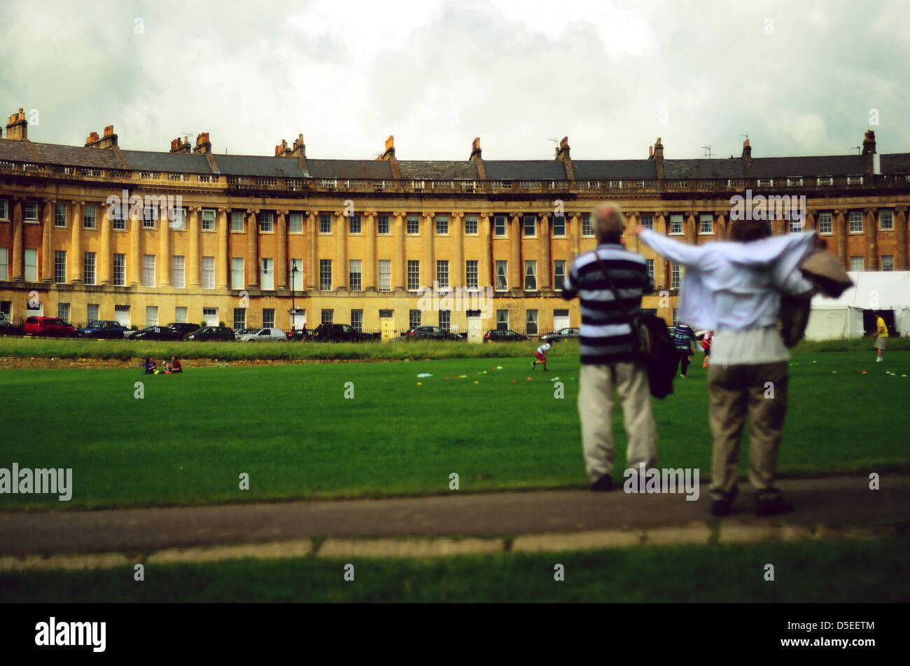 A photograph taken of two elderly people in a park in Bath, UK. Stock Photo