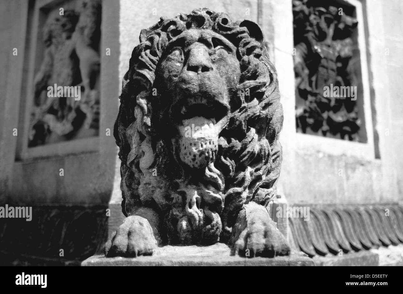 A black and white photograph of a Lion statue, Stock Photo