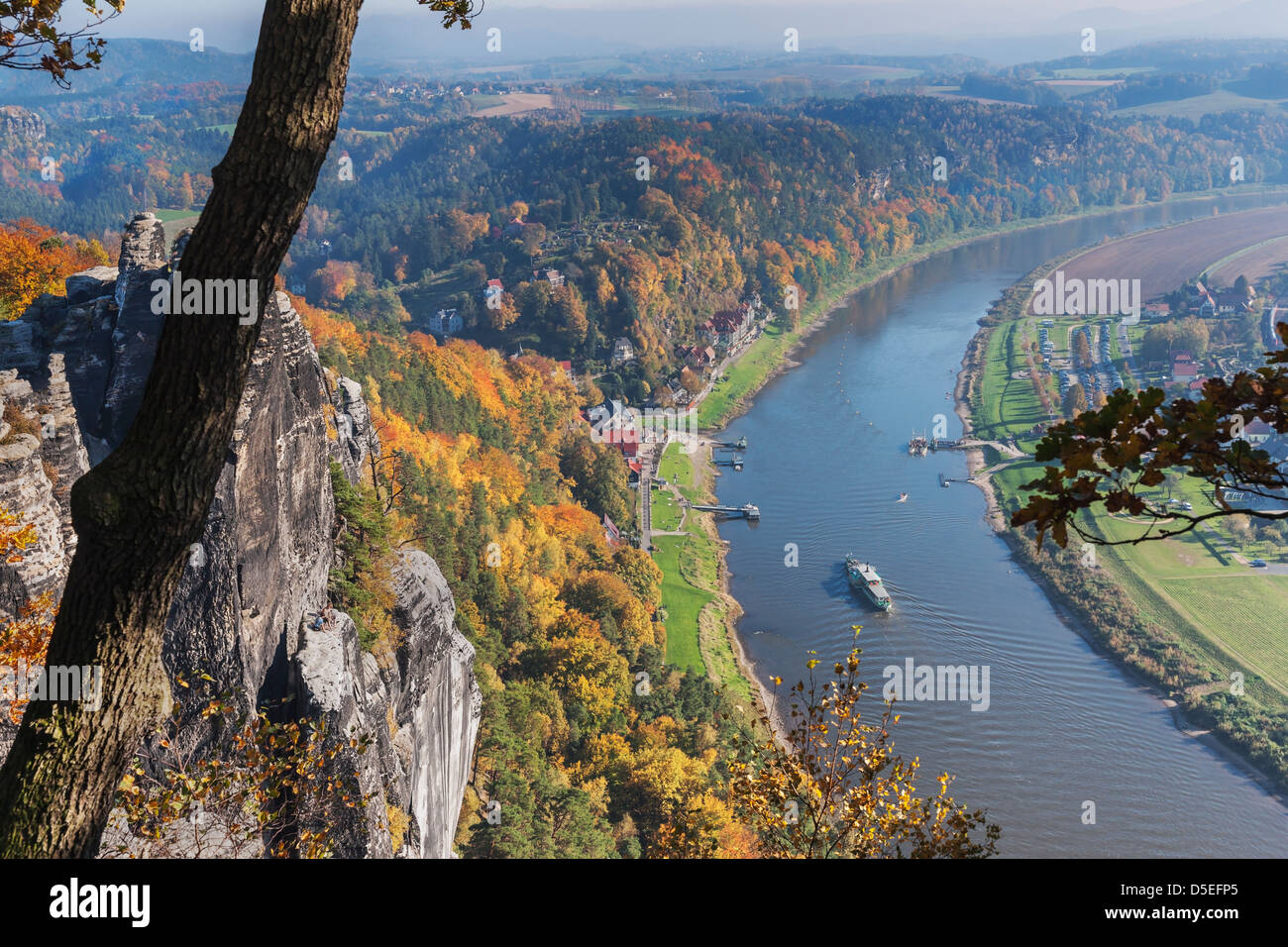 View from the rock formation Bastei (Bastion) to health resort Rathen, near Dresden, and the Elbe River, Saxony, Germany, Europe Stock Photo