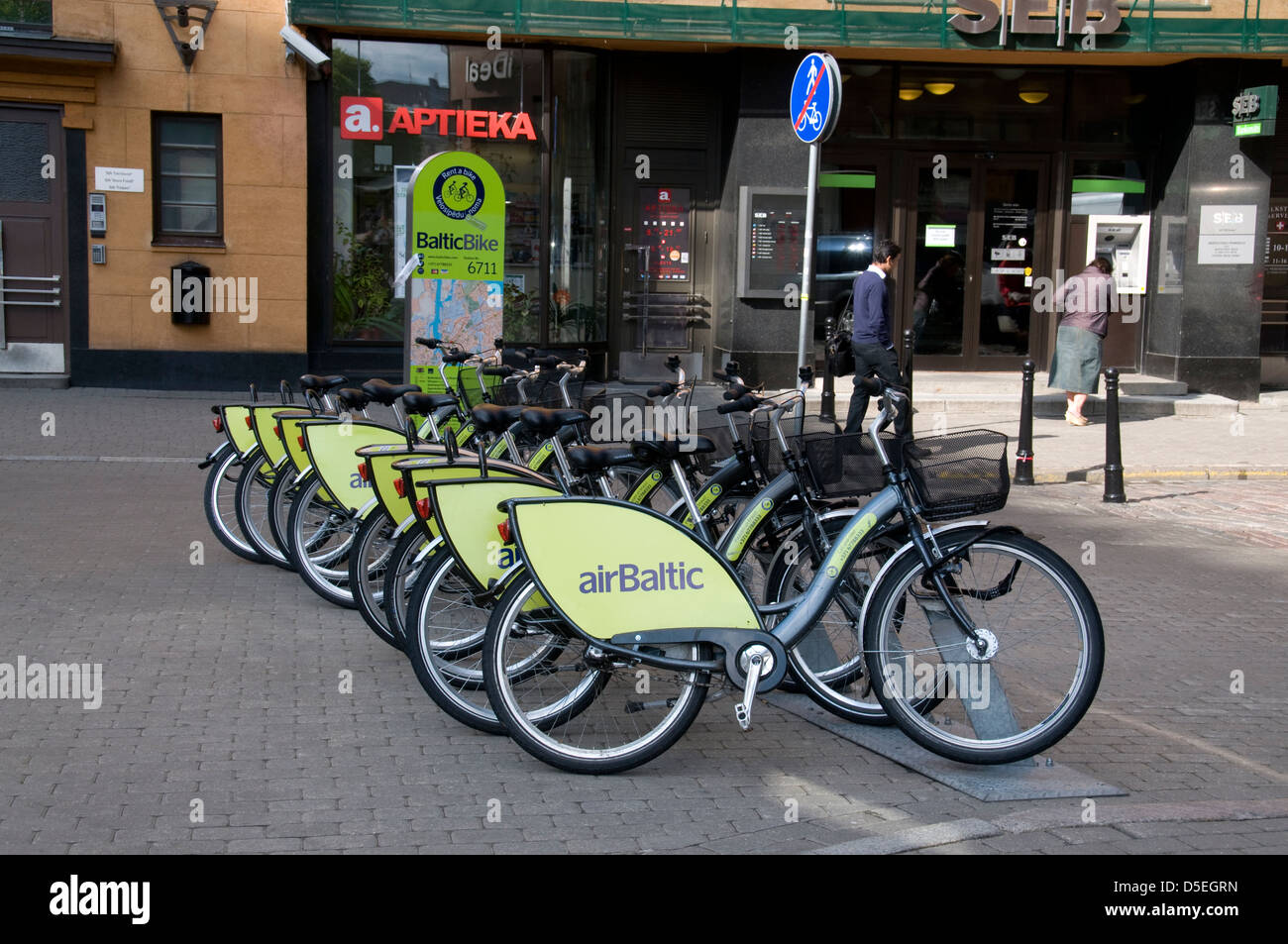 A rent-a-bike stand sponsored by airBaltic in Riga Old Town, Riga, Latvia, Baltic States Stock Photo