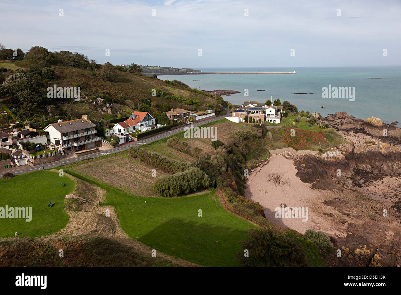 Houses on headland, Gorey, Jersey east coast, Channel Islands, UK Stock