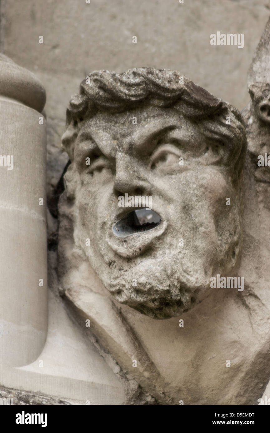 Decorative stone carving on Salisbury Cathedral - stone gargoyle. Stock Photo