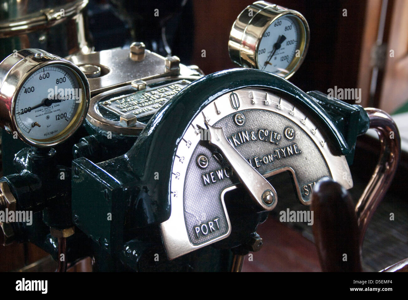 Boat helm control antique steering wheel on boat detailed Stock Photo