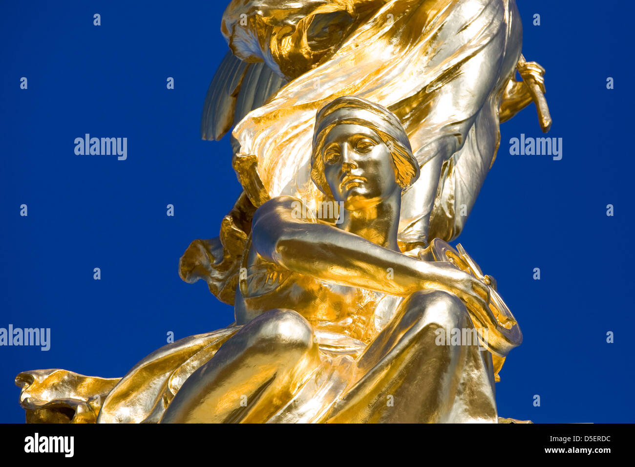 The Victoria Memorial golden statue of Victory London England Stock Photo