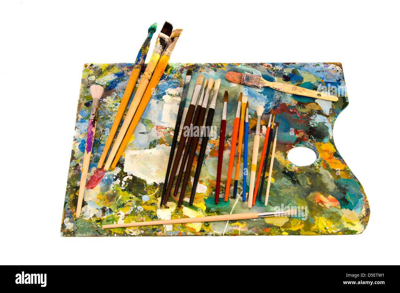 oil painters palette with brushes isolated on white Stock Photo Alamy