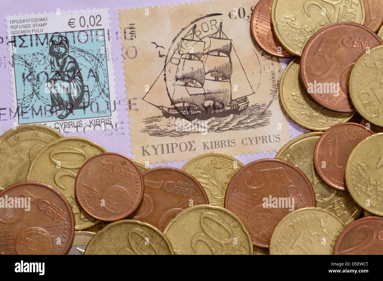 Euro coins and Cyprus stamps Stock Photo