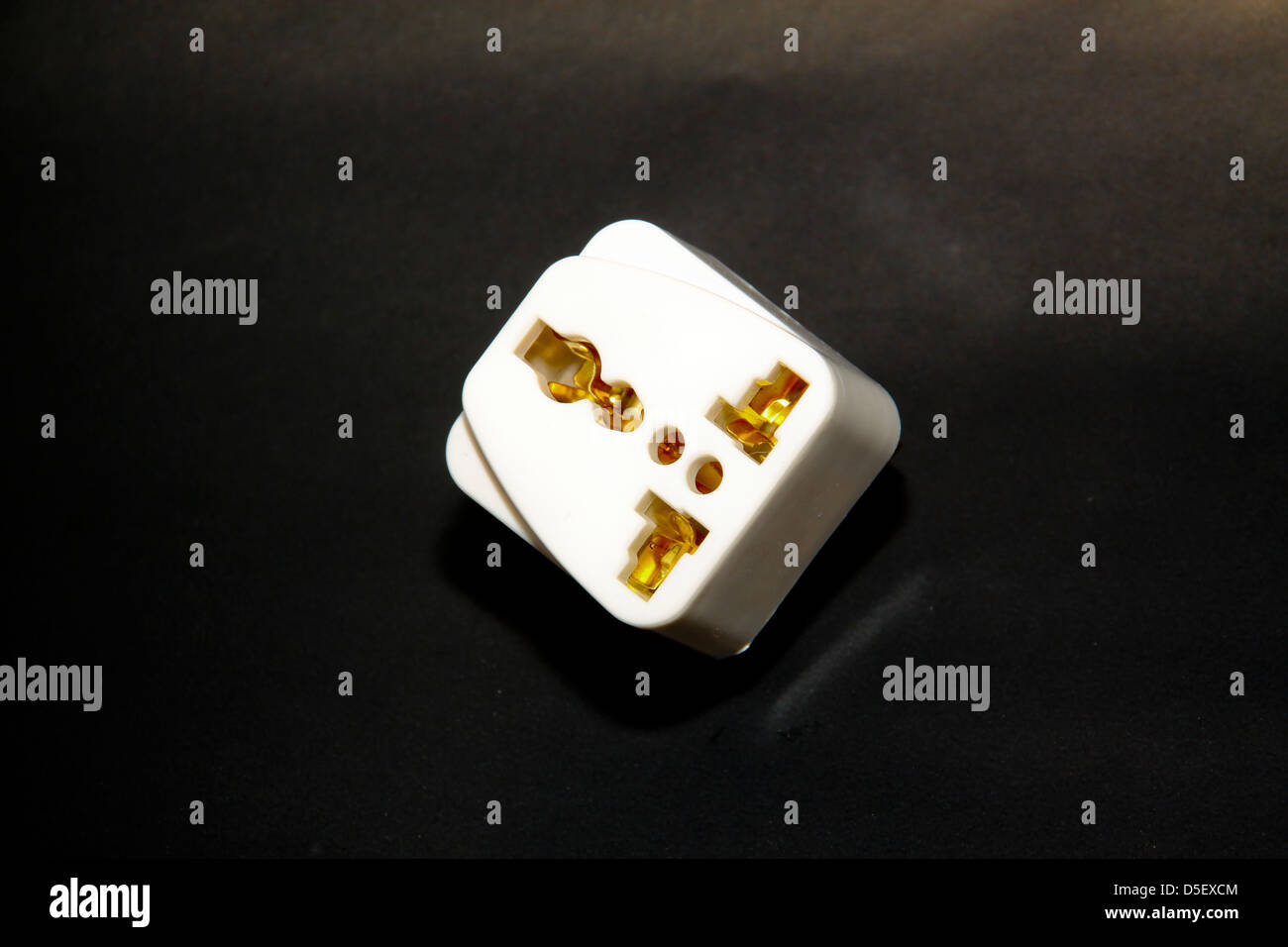 Continental to UK electric plug adapter Stock Photo Alamy