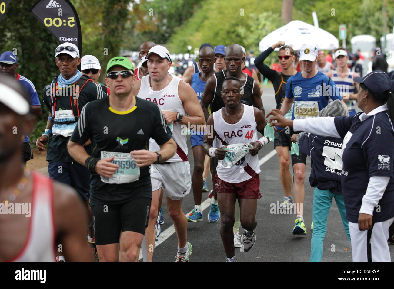 Cape Town, South Africa. 30th March, 2013. Competitors of the 44th consecutive Old Mutual Two Oceans Marathon in Cape Town. Over 10700 runners took part in what has been called 'the world's most beautiful marathon'. Stock Photo