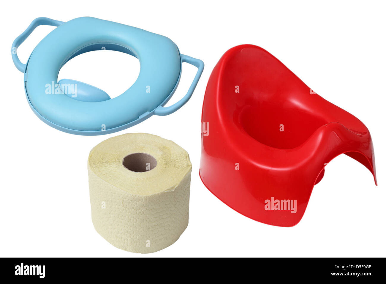 object for the baby - red potty, toilet paper and bowl Stock Photo