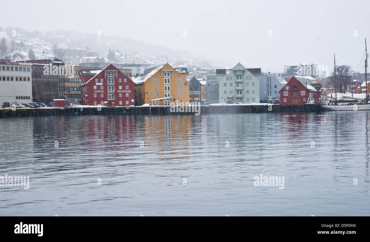 Scandanavian buildings reflected in the water on a winters day. Stock Photo