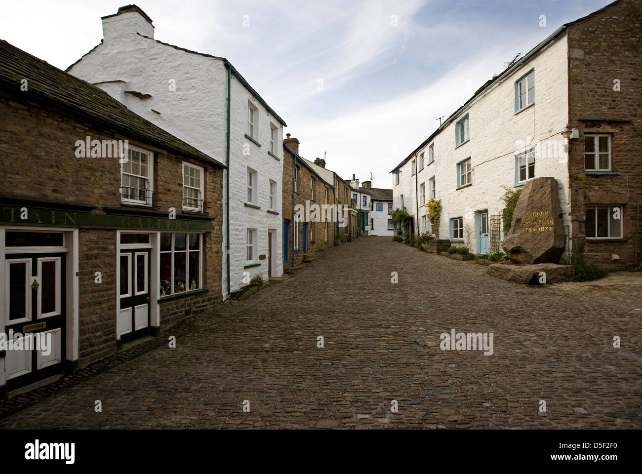 Cobbled streets and old stone cottages of Dent in Yorkshire Stock Photo