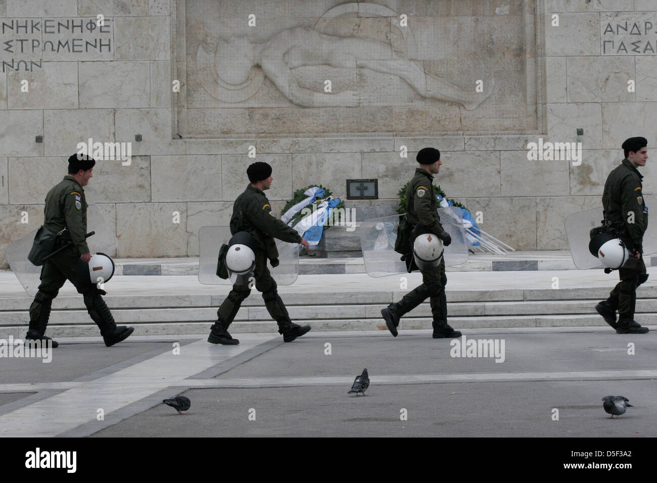 Athens, Greece. 31st March, 2013. Riot police take a position, during ...