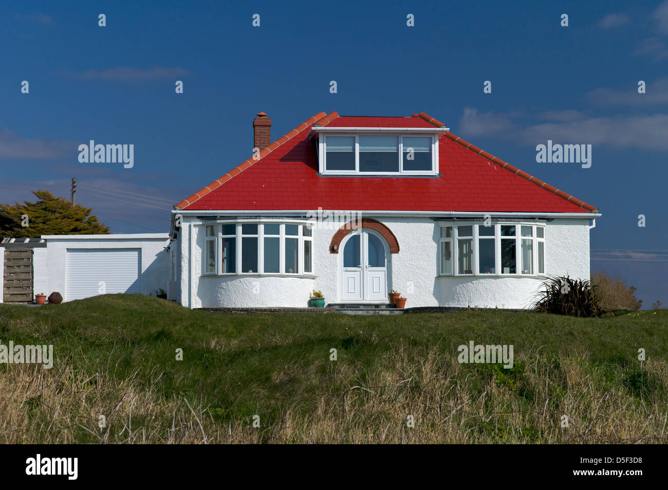 Bungalow with red roof, UK Stock Photo