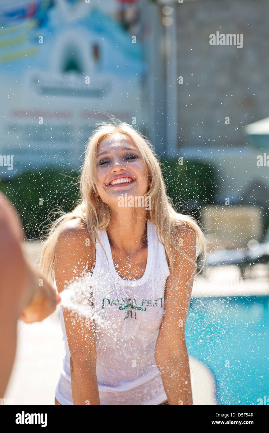 Summer contest wet tshirts in the pool Stock Photo Alamy