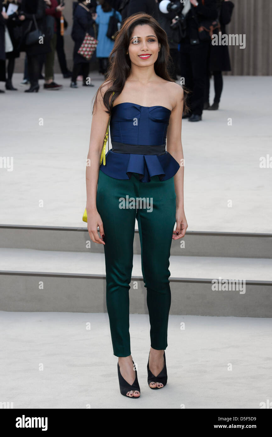 Indian actress Freida Pinto arrives for the Burberry Prorsum fashion collection during London Fashion Week. Stock Photo