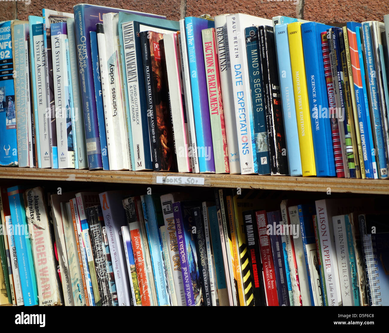 old books on a book shelf Stock Photo