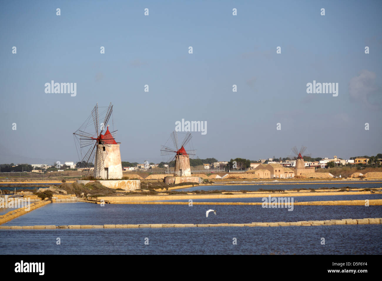 Windmills at Salt Pans in Trapani, Sicily, Italy Stock Photo