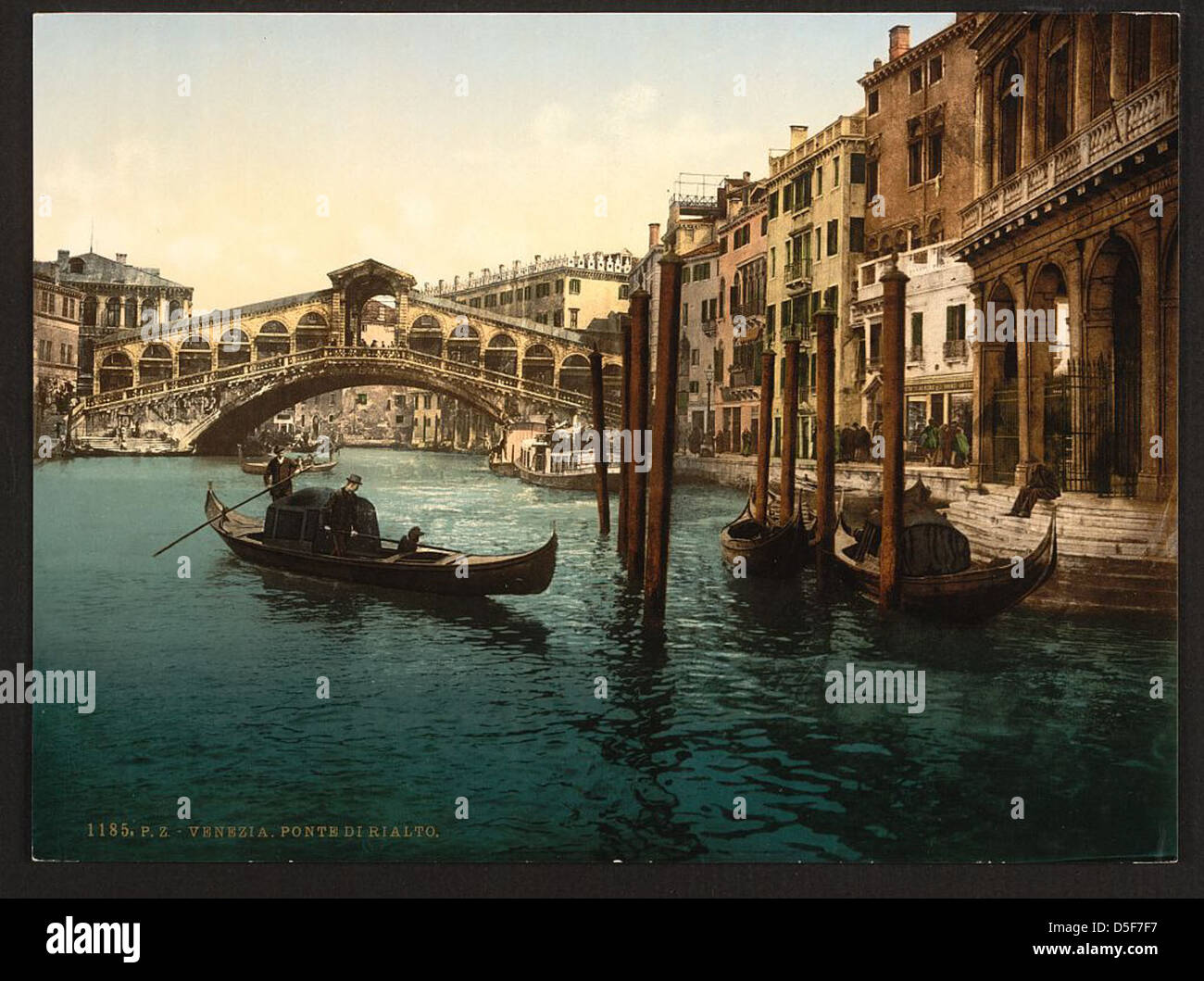 The Rialto Bridge in Venice, Italy, is one of the city's most iconic ...