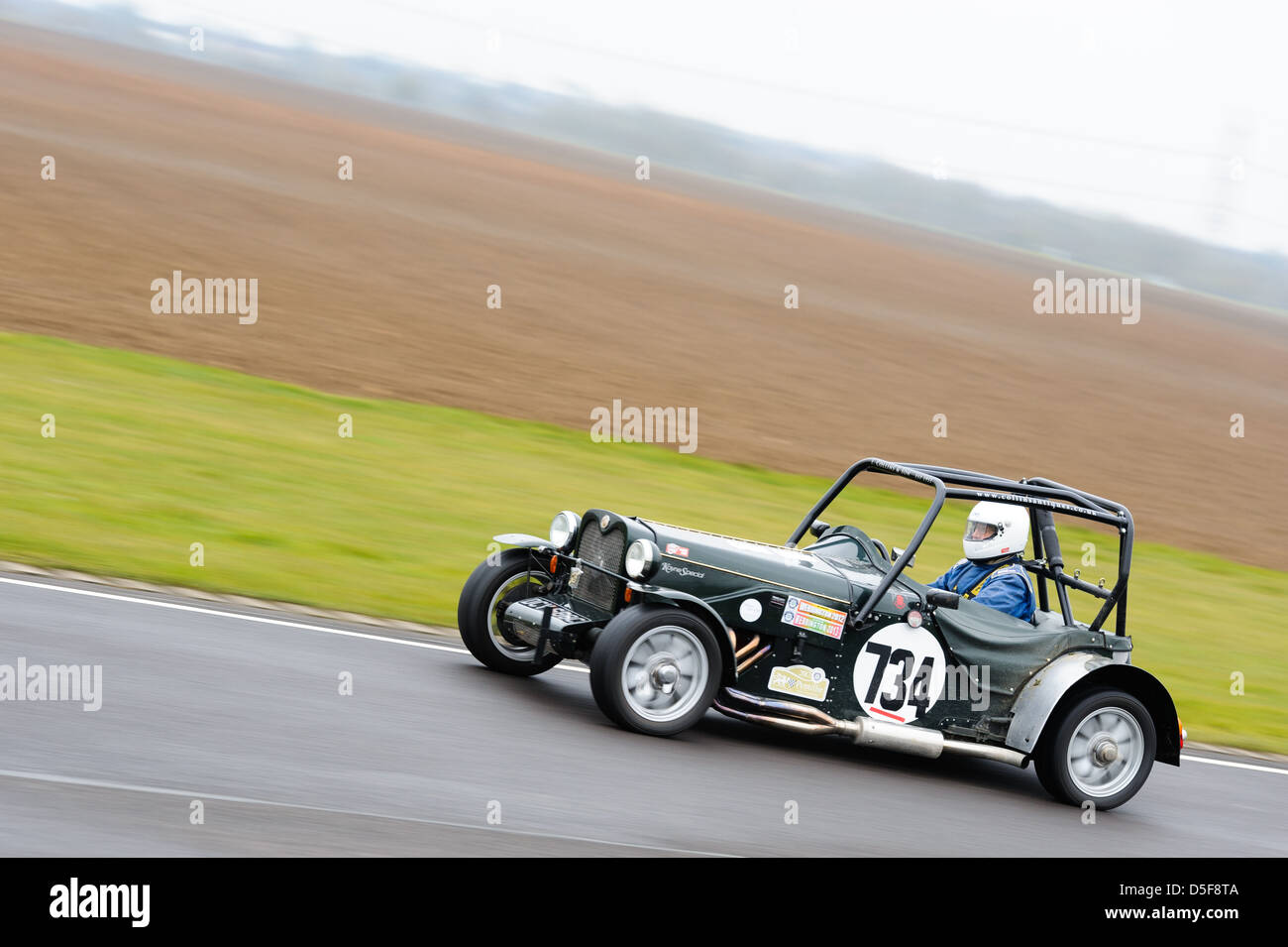 A car racing around Castle Combe Circuit at the Bristol Motor Club's ...