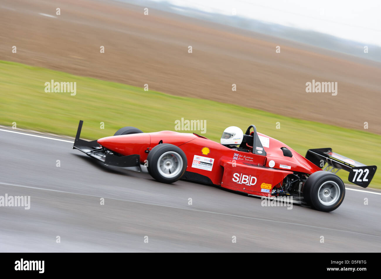 A car racing around Castle Combe Circuit at the Bristol Motor Club's ...