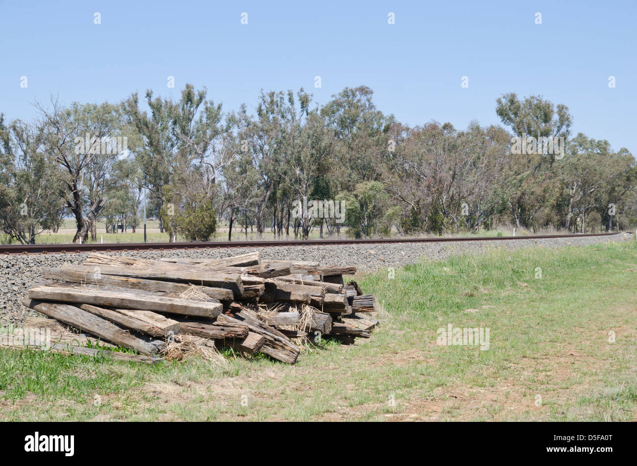 Old railway sleepers removed from line Stock Photo