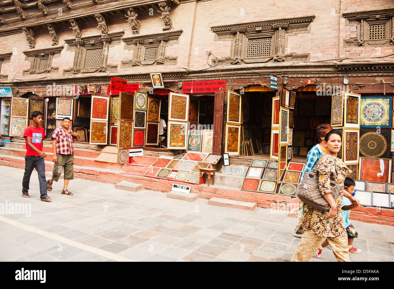 Tourists walking in a street, Hanuman Dhoka, Durbar Square, Kathmandu, Nepal Stock Photo