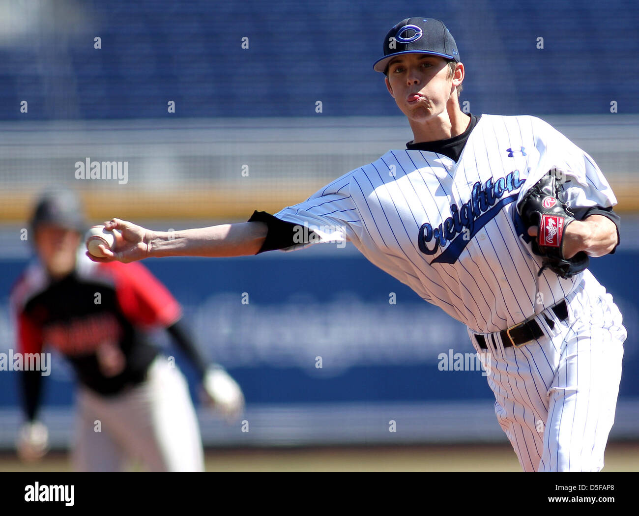 March 31, 2013 - Omaha, Nebraska, United States of America - March 31, 2013: Pitcher Bryan Sova of Creighton University makes a relief appearance late in the game during an NCAA Baseball game between the UNO Mavericks and the Creighton University Bluejays at TD Ameritrade Park in Omaha, NE...UNO defeated Creighton 4-2. Stock Photo