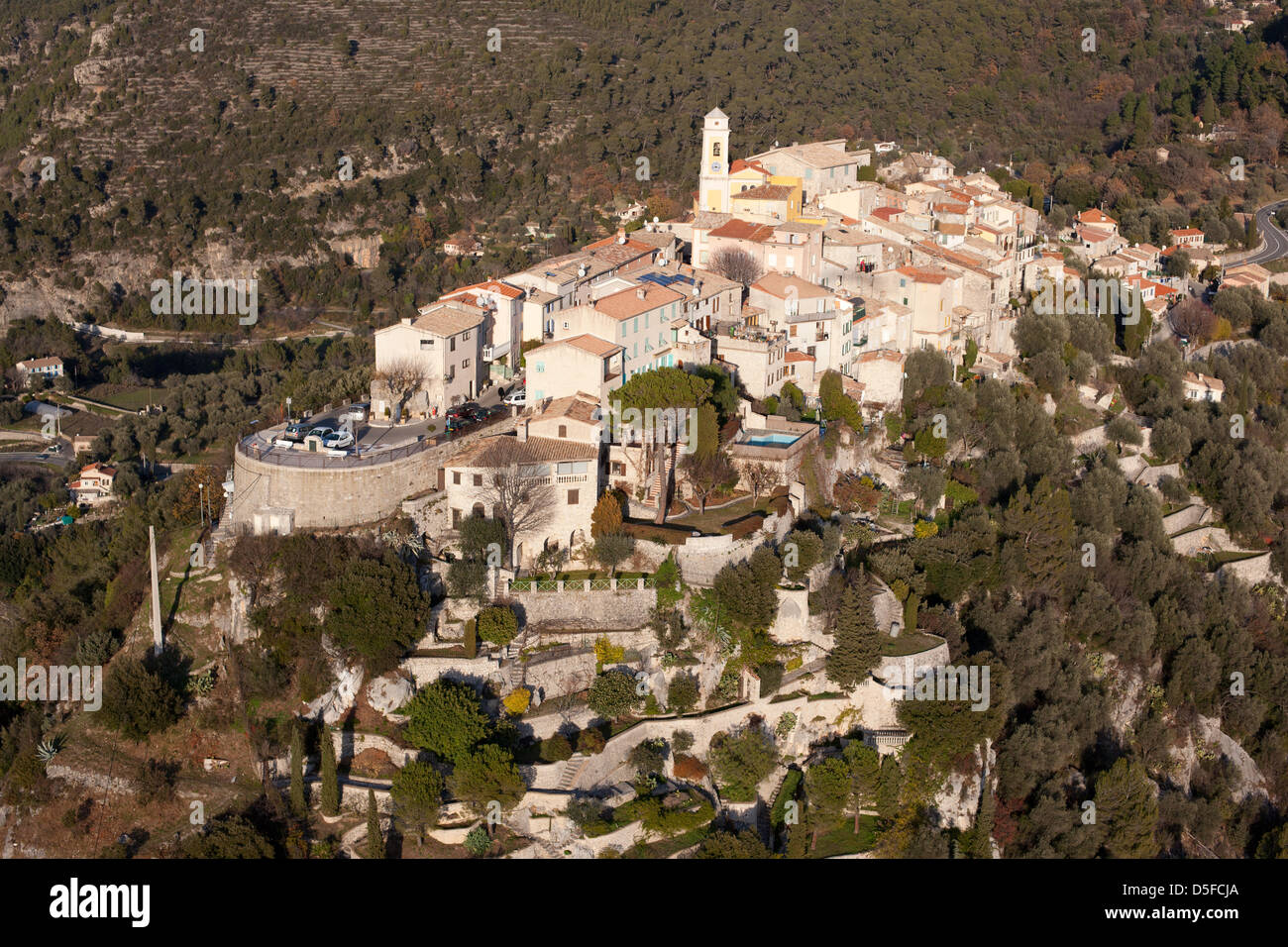 AERIAL VIEW. Perched medieval village. La Roquette-sur-Var, Alpes-Maritimes, French Riviera's backcountry, France. Stock Photo