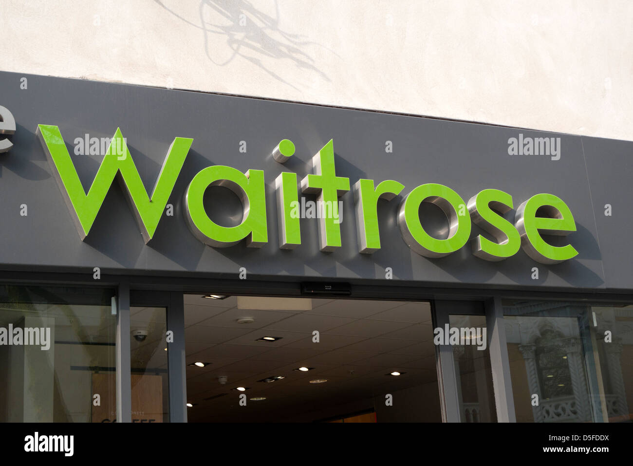 Waitrose supermarket sign logo on storefront UK  KATHY DEWITT Stock Photo