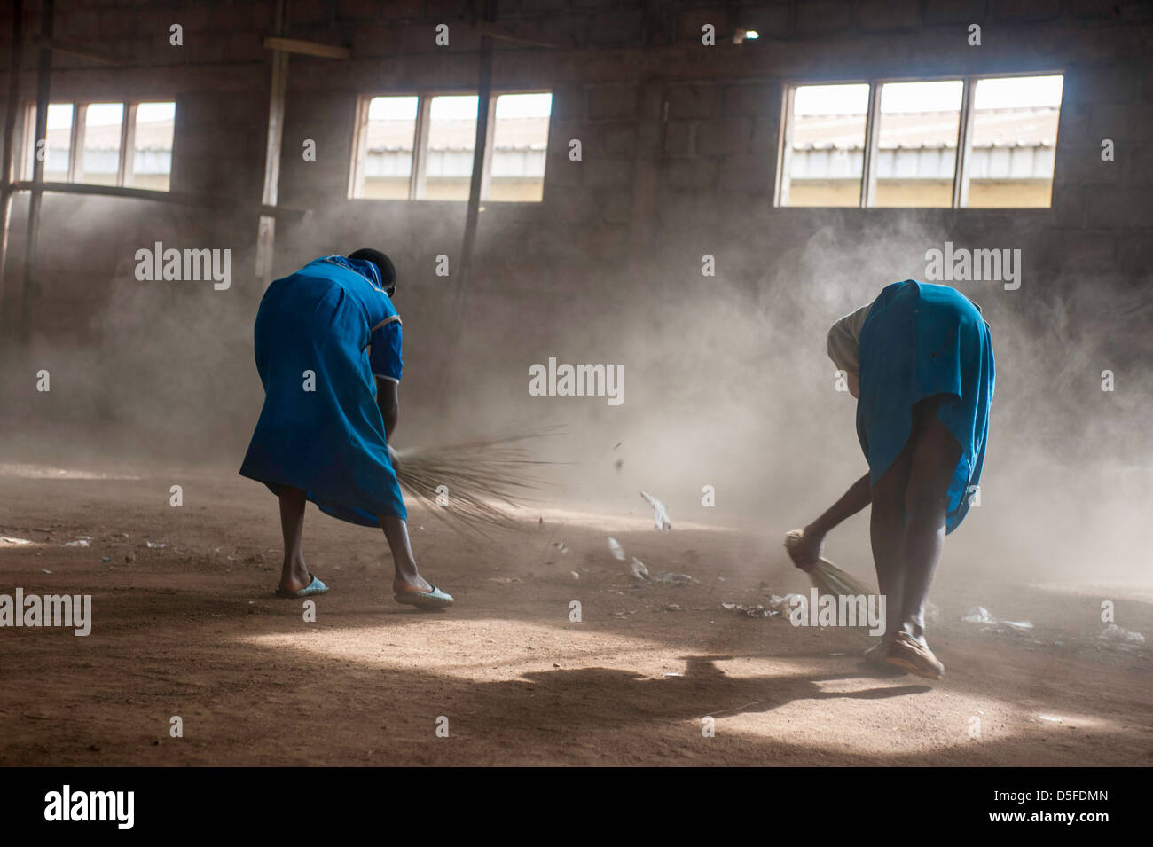 Cameroon girl sweeping dust hires stock photography and images Alamy