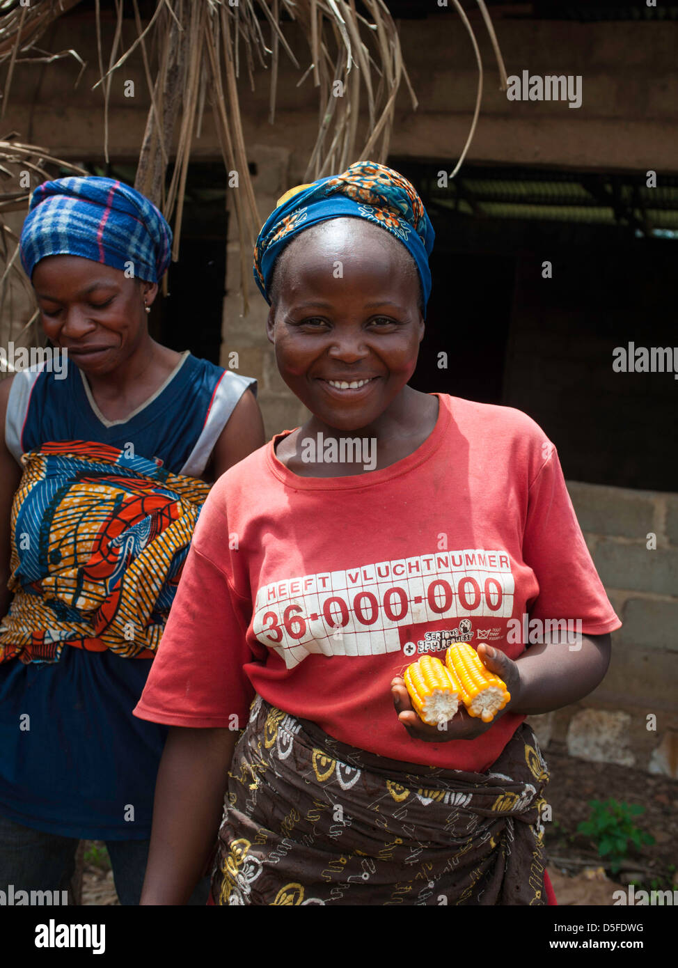 Young african woman holding corn near Bamenda Cameroon Stock Photo