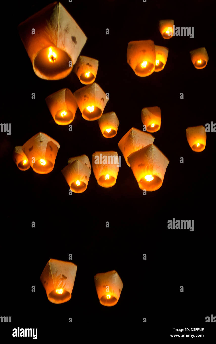 many Chinese lanterns floating in the sky during Sky Lantern Festival celebrated in Taiwan, 2 weeks after the Chinese New Year Stock Photo