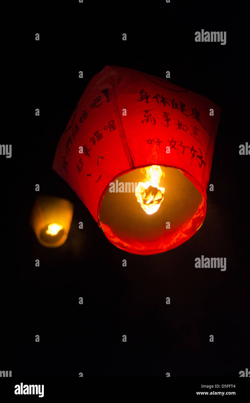 Chinese lanterns in the sky during Sky Lantern Festival, Taiwan Stock Photo