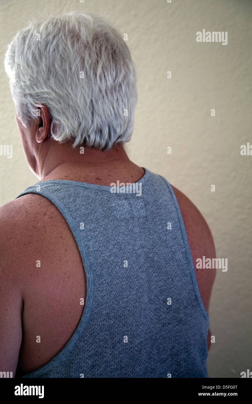 Man With Silver Hair and Vest Stock Photo