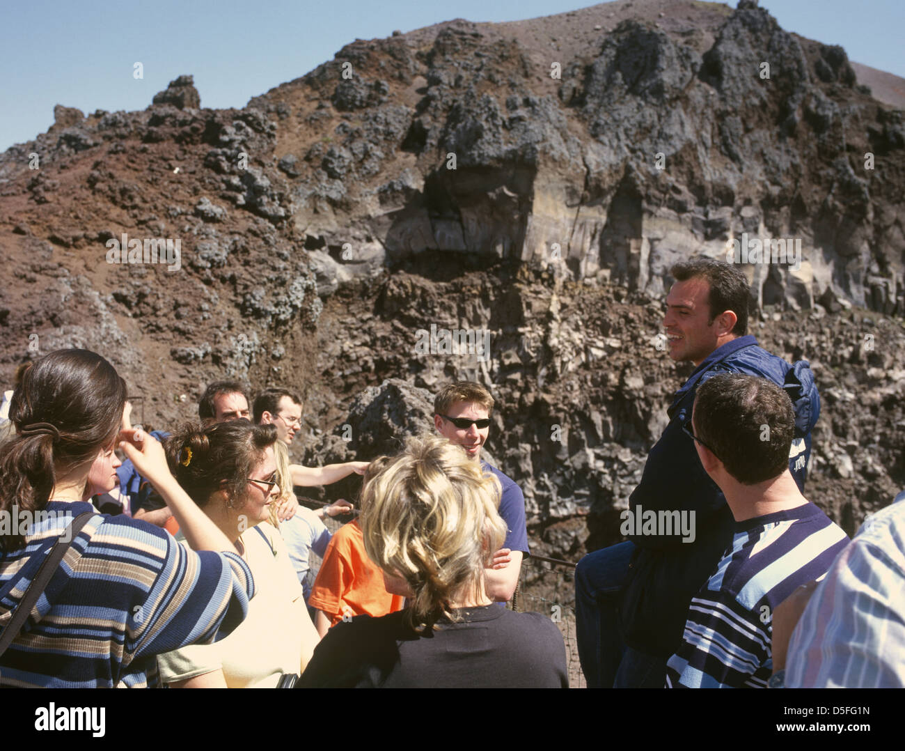 Italy Campania Mount Vesuvius Tourists listening to one of Vesuvius' many guides Stock Photo