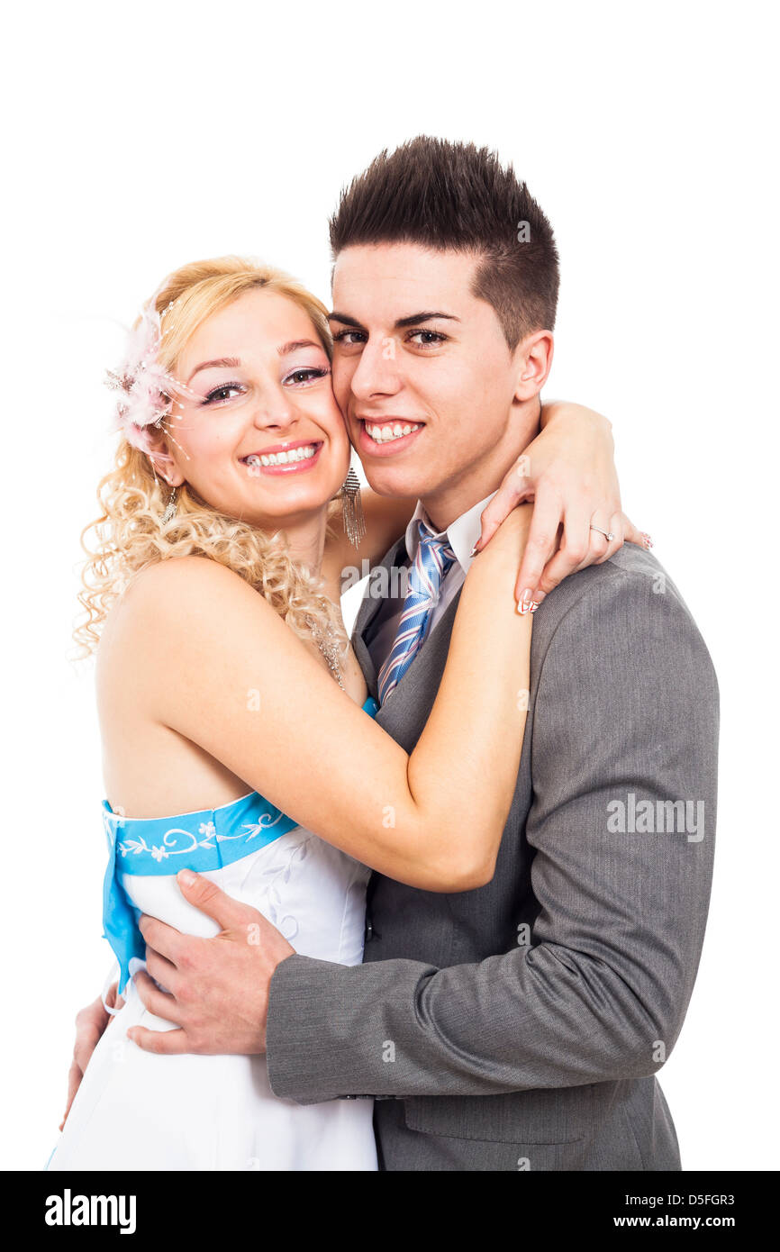 Portrait of young happy wedding couple, isolated on white background Stock Photo