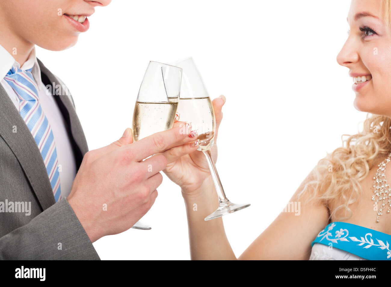 Happy couple toasting with glass of wine, isolated on white background Stock Photo