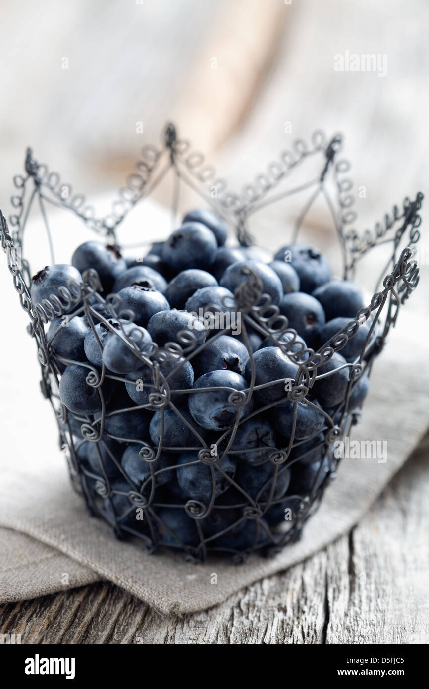 Fresh blueberries on wooden table, selective focus Stock Photo