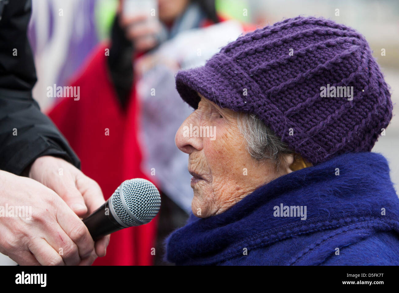 Aldermaston, UK. 1st April, 2013.  UK.  Britain's second oldest woman at 107, Hetty Bower, addresses the protesters at the west gate. Campaign for Nuclear Disarmament (CND) protest the Atomic Weapons Establishment (AWE) site at Aldermaston, Berkshire. CND aim to highlight their opposition to Britain's Trident nuclear weapons system and plans to replace it. Credit: Martyn Wheatley/Alamy Live News Stock Photo