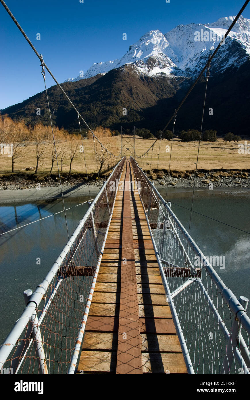 Swing Bridge crossing the Matukituki River. Mount Aspiring National Park. South Island, New Zealand. Stock Photo