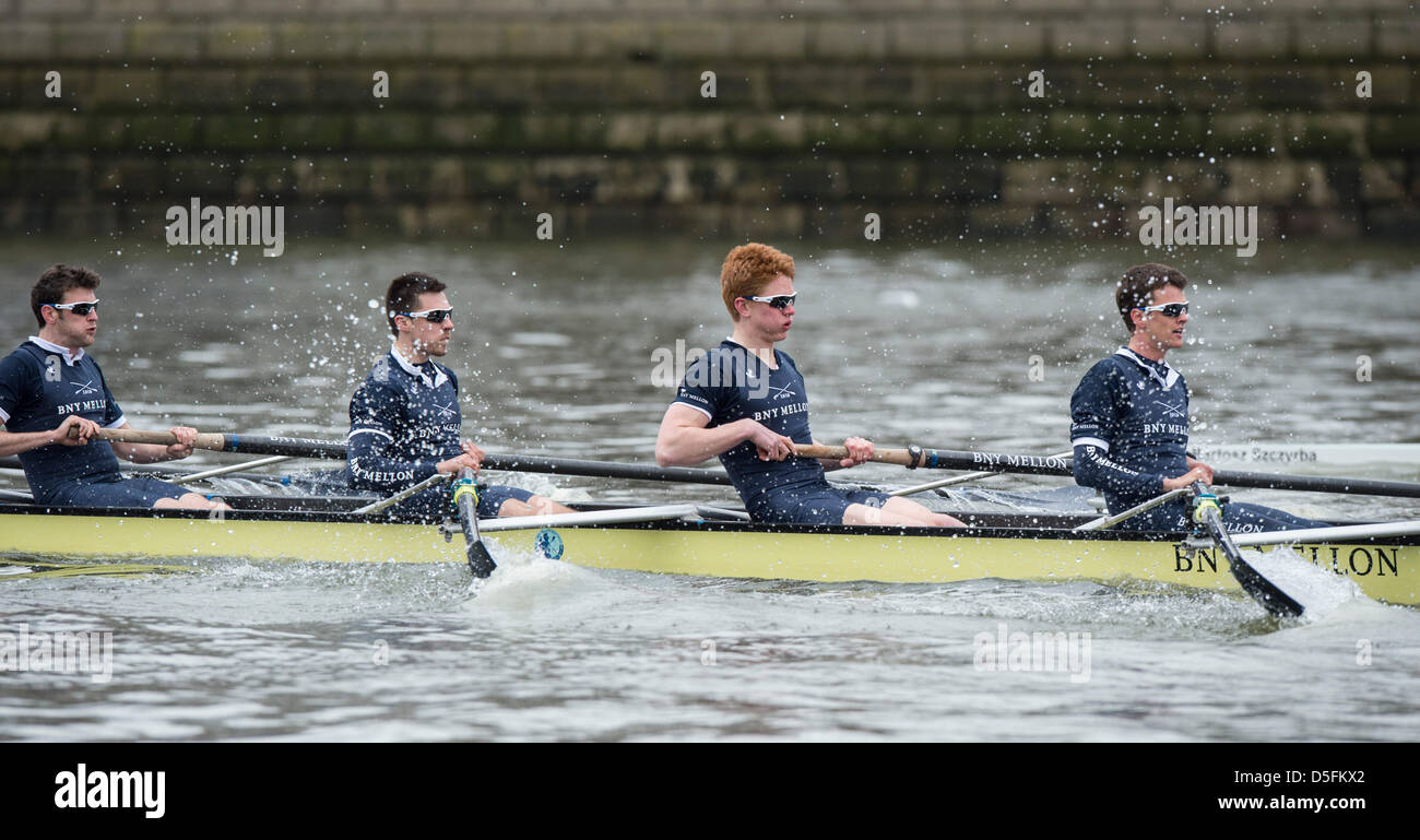 London, UK. 31st March, 2013. Oxford & Cambridge Universities Boat Race 2013 held on the River Thames between Putney and Mortlake in London UK. The Isis v Goldie (second boats) race prior to the main Blue Boats Race. Isis (Oxford 2nd boat):- Bow: Iain Mandale, 2: Nicholas Hazell, 3: Dr Alex Woods, 4: William Zeng, 5: Joe Dawson, 6: Ben French, 7: James Stephenson, Stroke: Tom Watson, Cox: Laurence Harvey. Goldie (Cambridge 2nd boat):- Bow: Chris Snowden, 2: Alexander Leichter, 3: Joshua Hooper, 4: Helge Gruetjen, 5: Alex Ross, 6: Jack Lindeman, 7: Mike Thorp, 8: Rowan Lawson, Cox: Sam Ojserkis Stock Photo