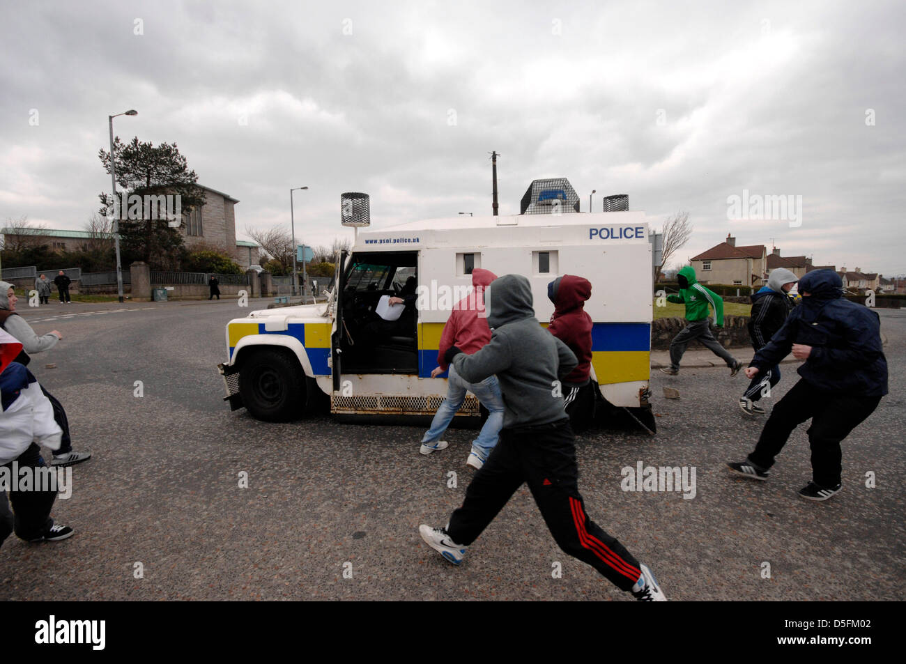 Londonderry, UK. 1st April, 2013. Youths attack a PSNI Landrover at a 32 County Sovereignty (32 CSM) commemoration to mark the 97th anniversary of the 1916  Easter Rising. Credit: George Sweeney/Alamy Live News Stock Photo