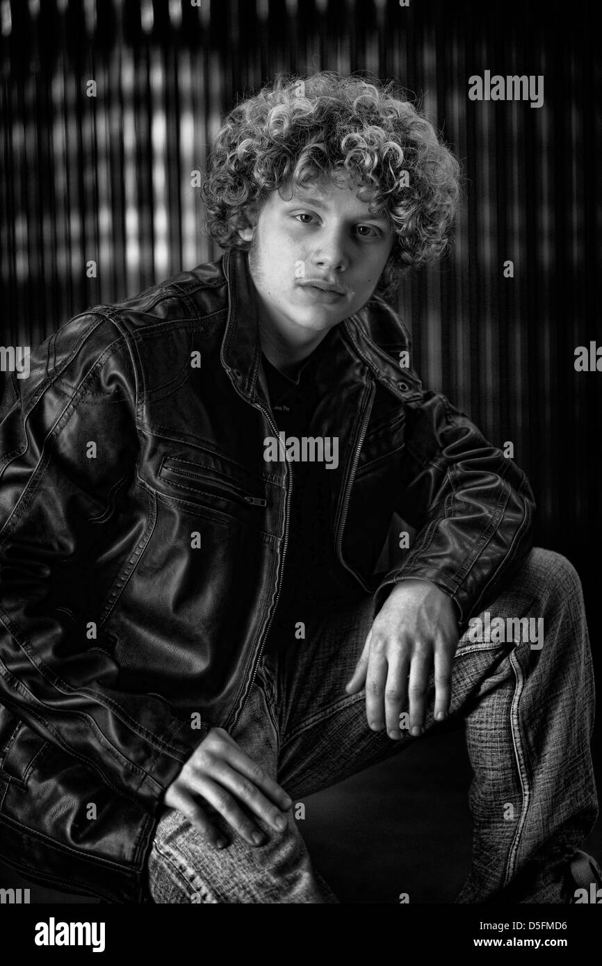 A Teenage Boy With Long Curly Hair Stock Photo 55049714 Alamy