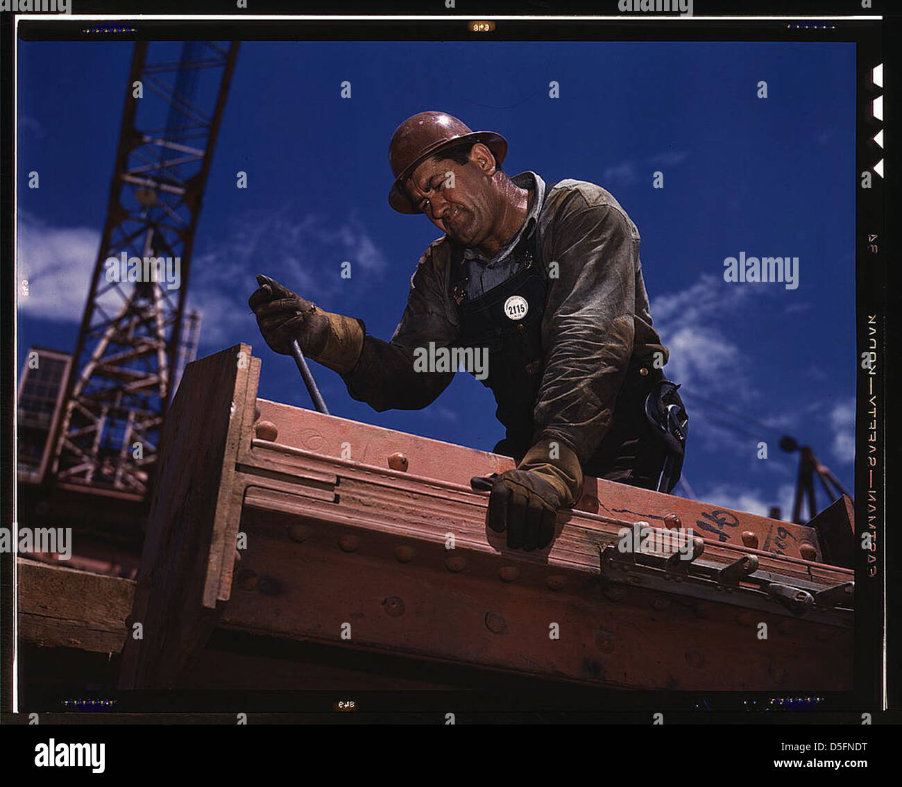A photograph of Big Pete Ramagos, a rigger at work on the construction ...