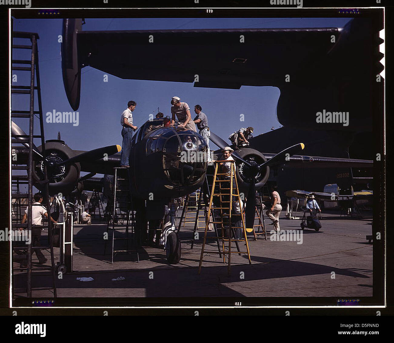 On North American's outdoor assembly line, employees rush a B-25 to completion, N[orth] A[merican] Aviation, Inglewood, Calif. (LOC) Stock Photo