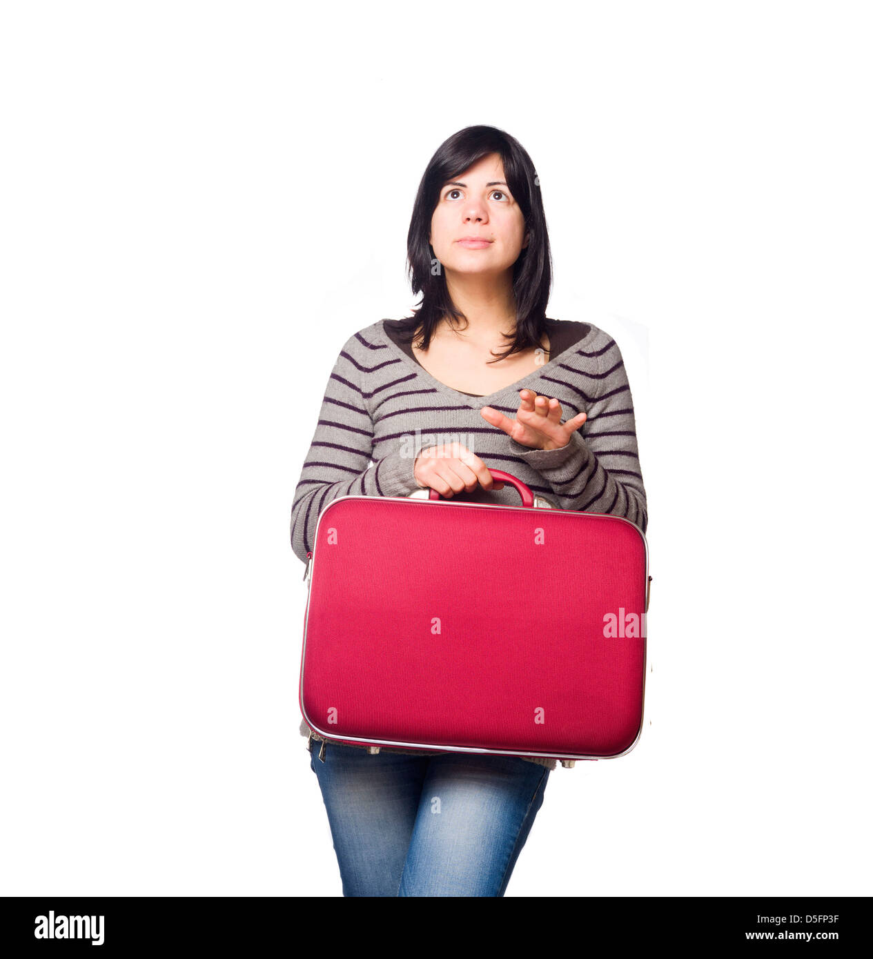 Portrait of pretty young woman holding a red suitcase isolated on white background Stock Photo