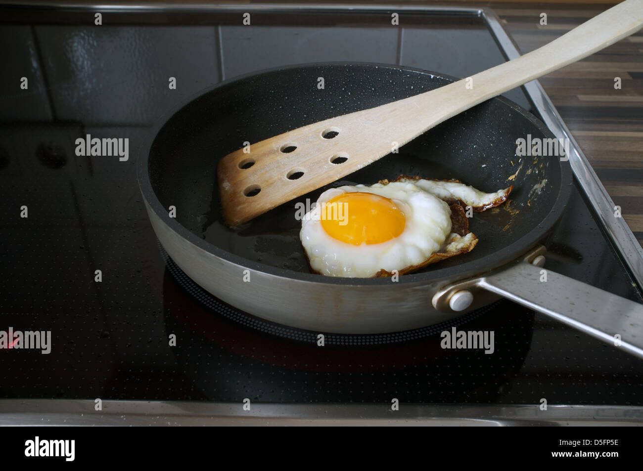 Fried egg in frying pan Stock Photo