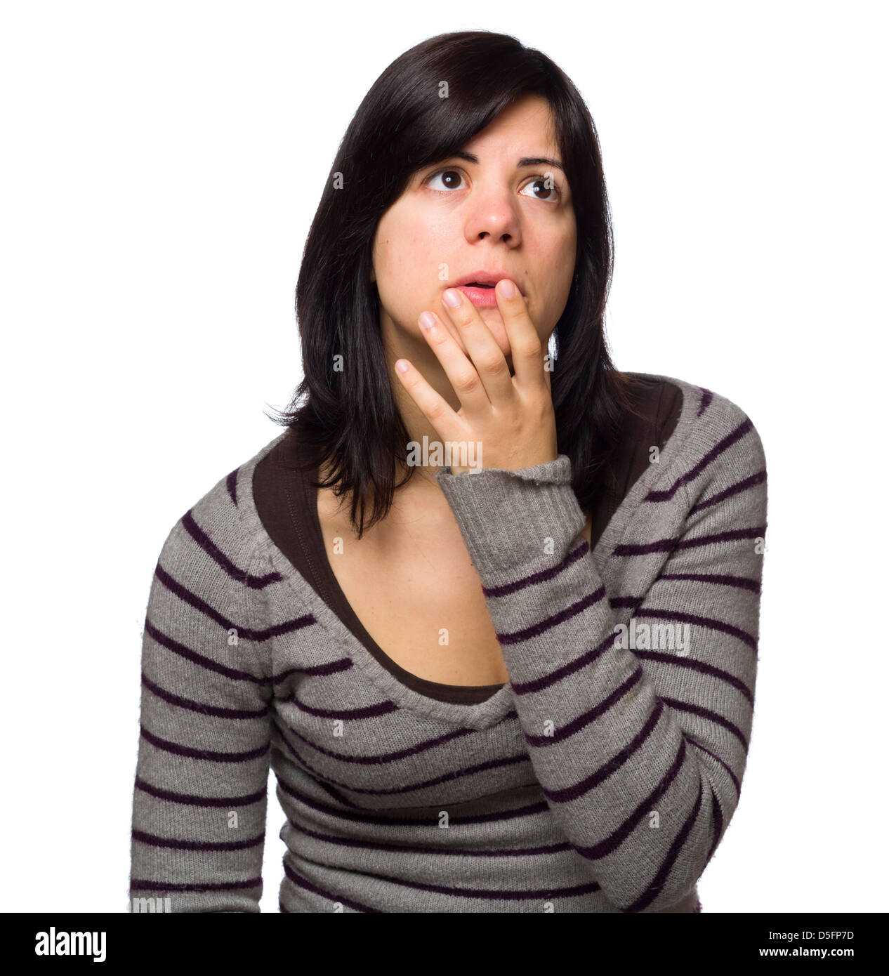 Portrait of pensive young woman with hand on chin isolated on white background Stock Photo