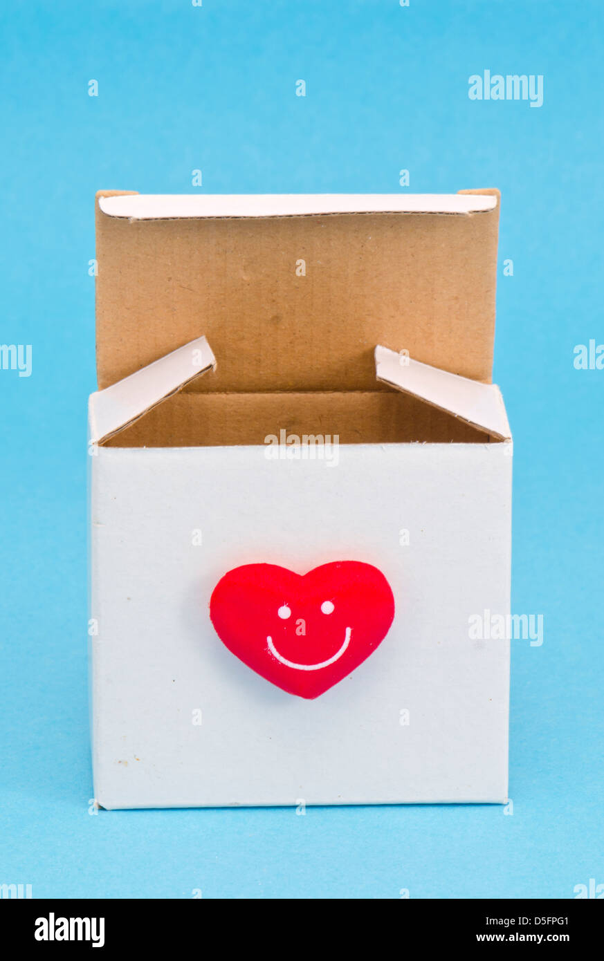 open white gift box with red heart on azure background Stock Photo Alamy